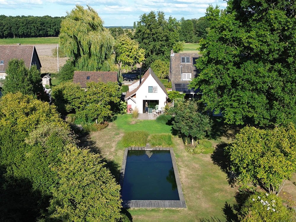 Duurzaam vakantiehuisje met zwemvijver